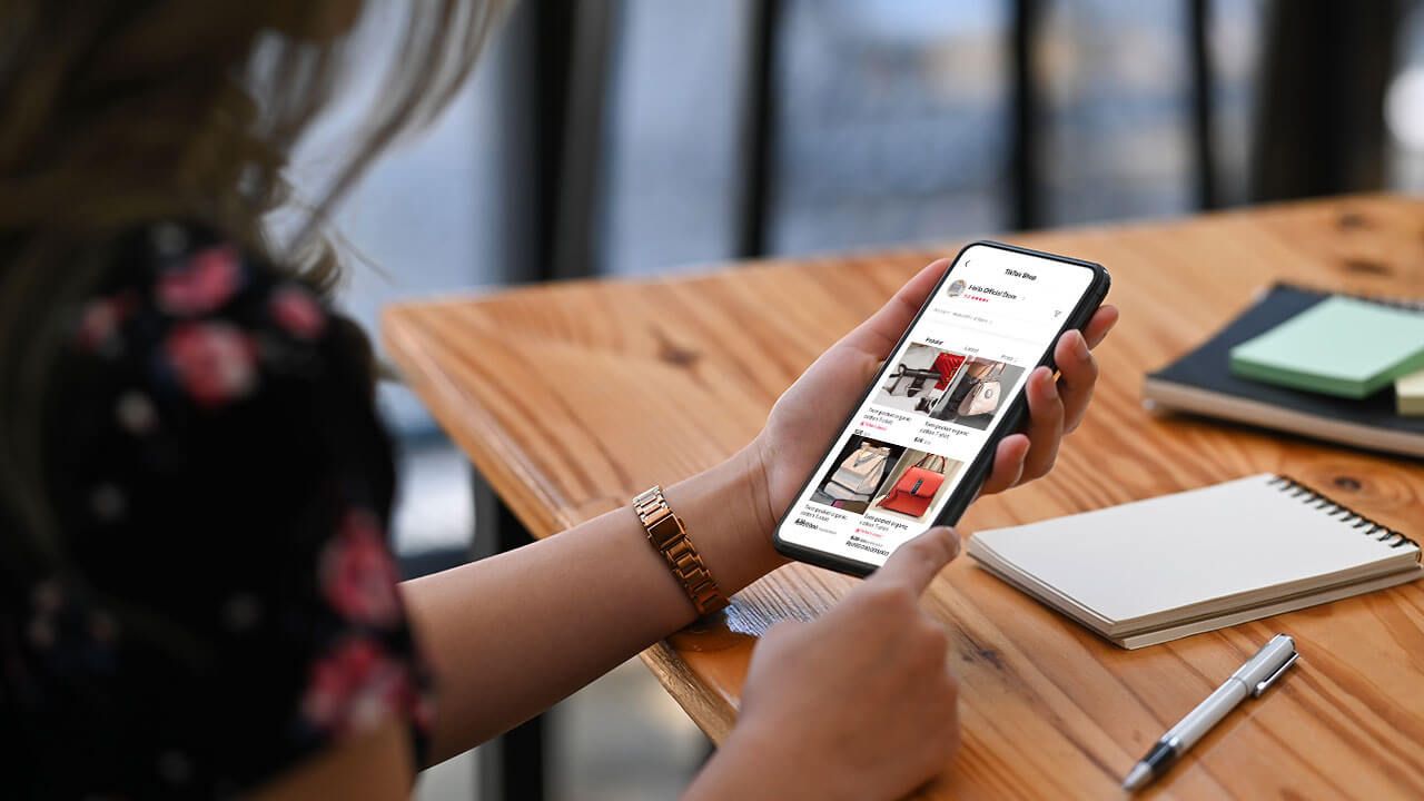 phone displaying TikTok shopping interface