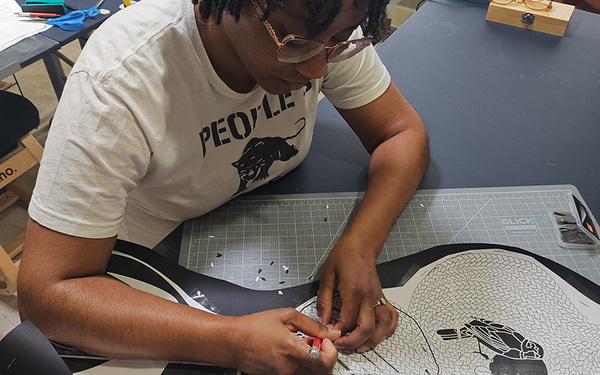 Featured Artist Janelle Washington is Honoring the Black Experience, One Sheet of Paper at a Time